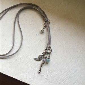 Leather lariat with charms and gemstone beads